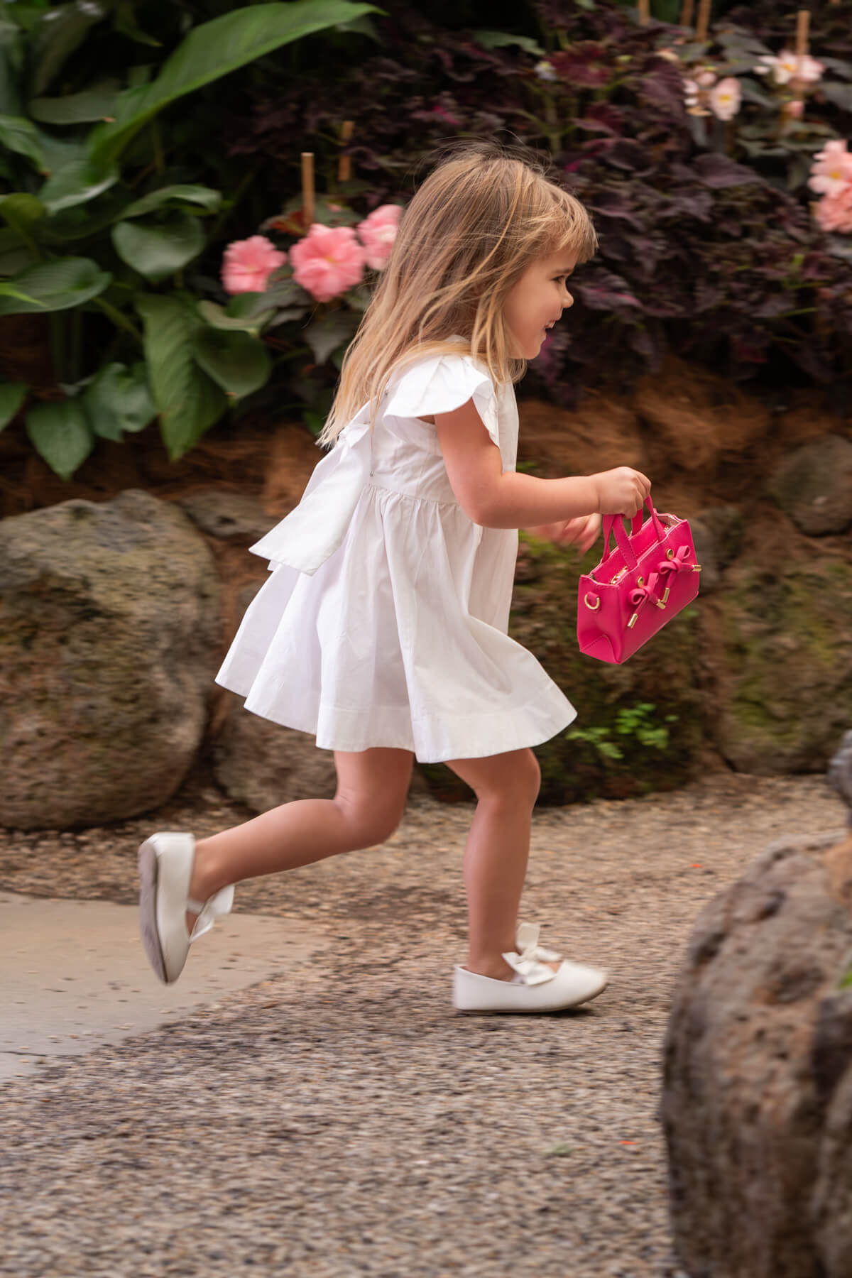 Edwina Clare pink mini girls handbag captured in real-life lifestyle imagery designed for modern brands by Sarah Eliza Images Melbourne