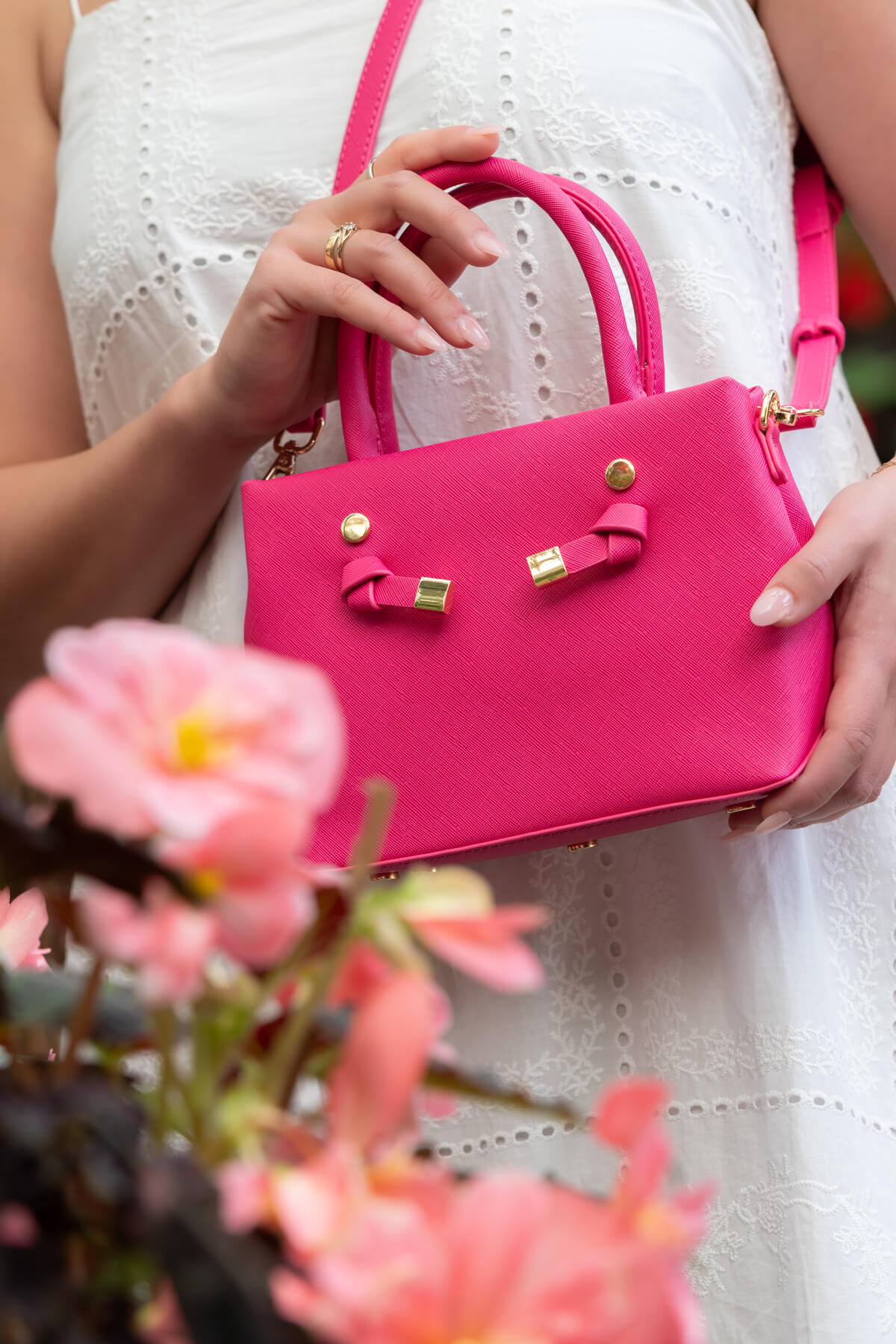 Close-up detail of Edwina Clare pink handbag showcasing texture in product lifestyle photography by Sarah Eliza Images Melbourne Australia
