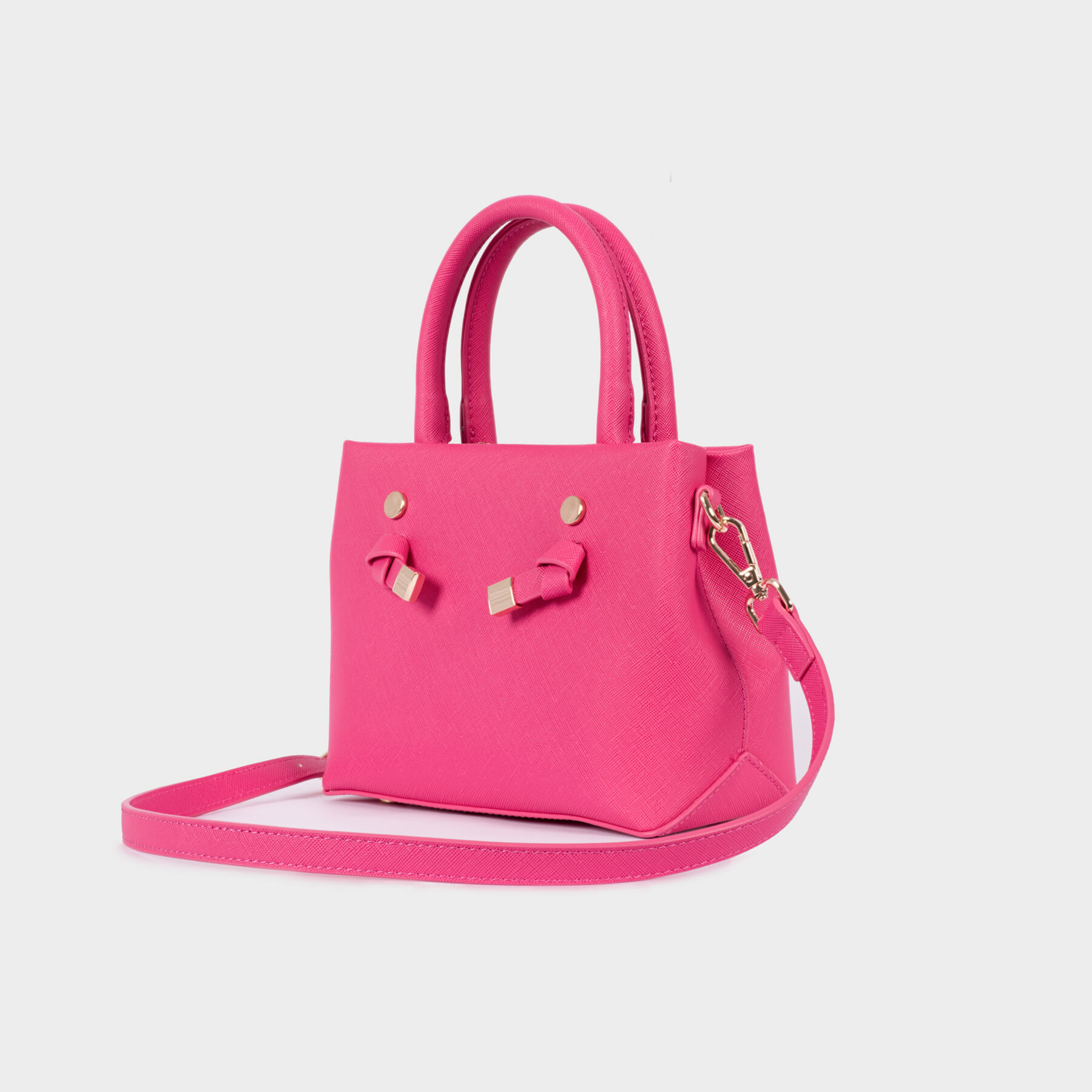 Edwina Clare pink handbag on grey background, e-commerce product photography by Sarah Eliza Images Melbourne Australia