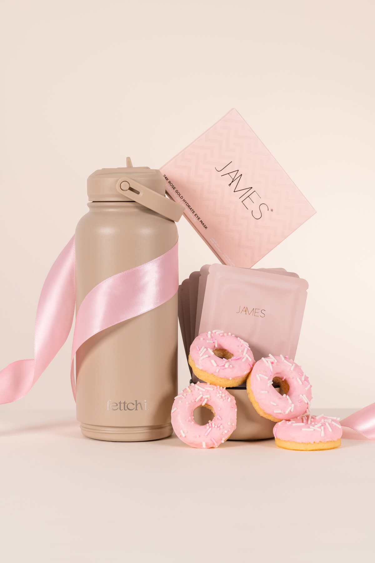 Fettchi Mother’s Day gift set beautifully packaged with drink bottle, mini donuts and eye mask styled in soft feminine tones