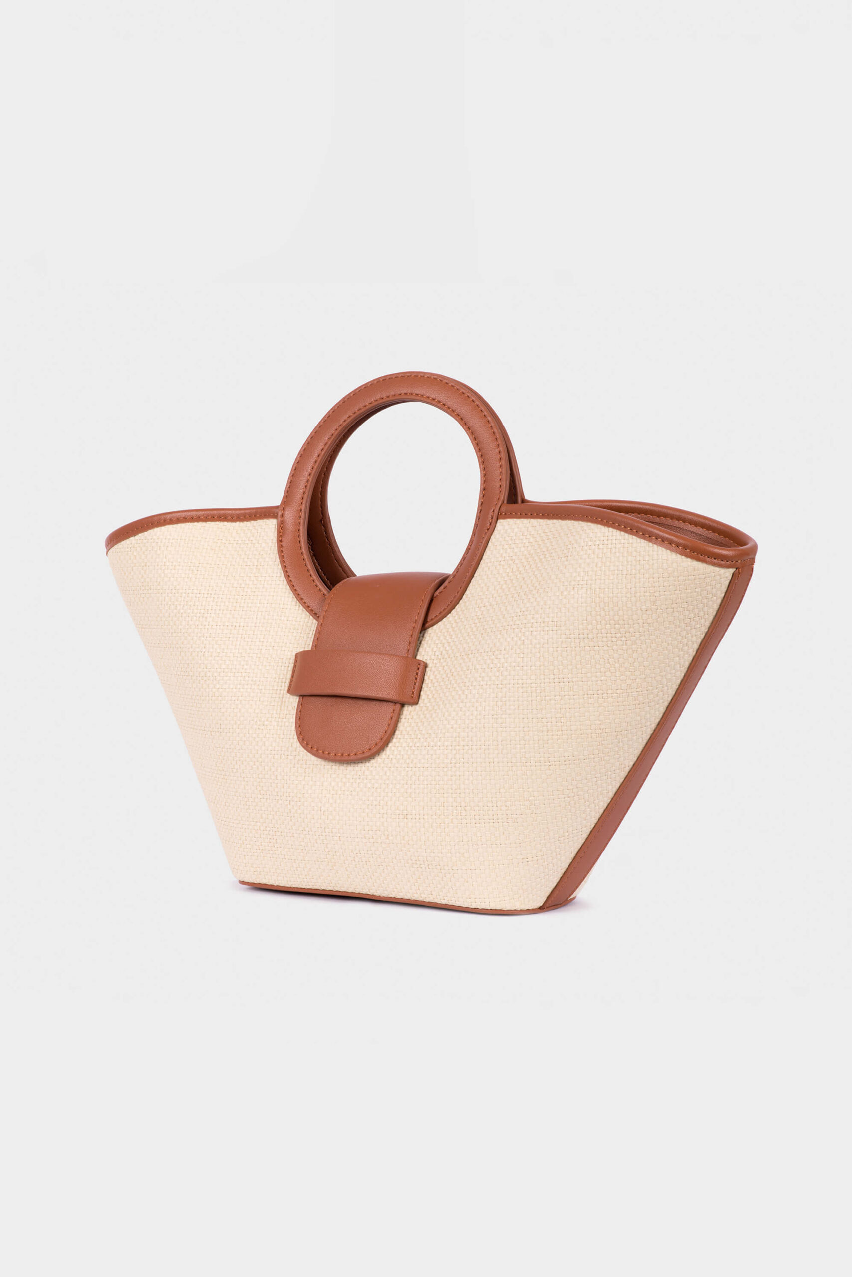 E-commerce image of Edwina Clare Hand Bag photographed on a plain light grey background, in Melbourne Product Photography Studio. Simple, clean, and distraction-free.